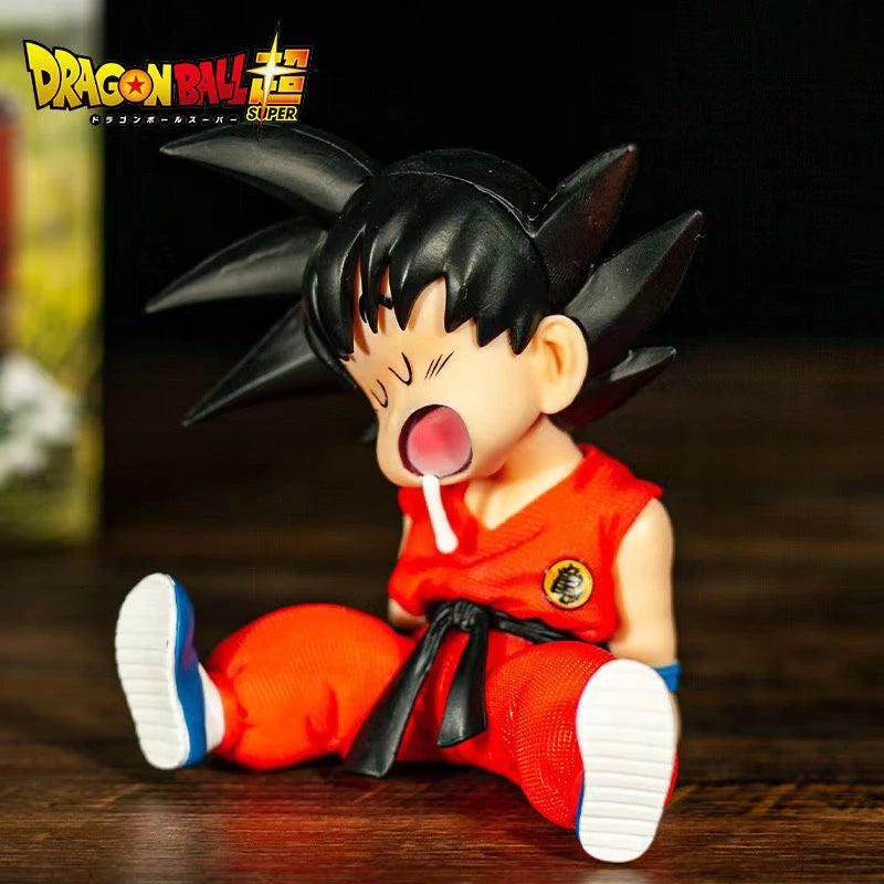 10cm Dragon Ball Z Anime Pvc Auto Accessories Sitting Posture Sleep Son Goku Model Toys Gifts Action Figures Anime Figure