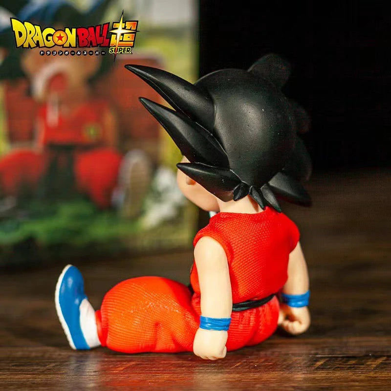 10cm Dragon Ball Z Anime Pvc Auto Accessories Sitting Posture Sleep Son Goku Model Toys Gifts Action Figures Anime Figure